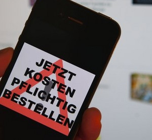 Hinweis bei Bestellung per Handy; Bild: dpa