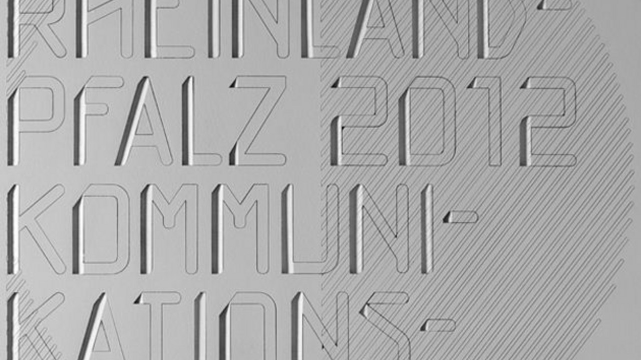 Logo „Designpreis Rheinland-Pfalz 2012"; Quelle: www.descom.de