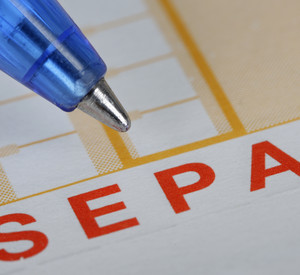 Überweisungsträger mit der Aufschrift SEPA; Bild: dpa